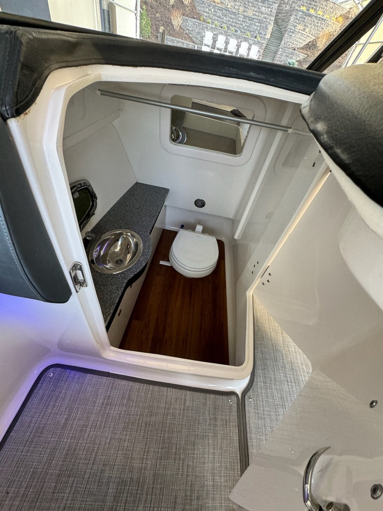 Deep cleaned boat restroom cabin